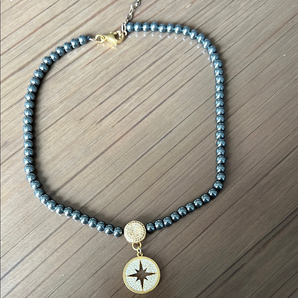 Gold and Silver Star Pendant Necklace